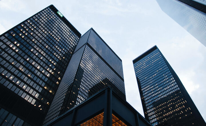 looking up at skyscrapers